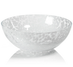 The Liguria Confetti Bowl by Zodax is a white glass bowl with a dappled pattern and subtle reflections, making it an elegant glass accent for sophisticated interiors.