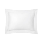 The Adagio Blanc Bedding Collection by Yves Delorme features a white rectangular pillow with a wide, stitched border, crafted from 500 thread count cotton sateen and adorned with quilted etoile embroidery, shown on a plain white background.