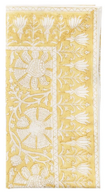 The Provence Napkin Set by Kim Seybert features folded yellow napkins with white floral and leaf embroidery—an eye-catching addition, perfect for pairing with a matching tablecloth.