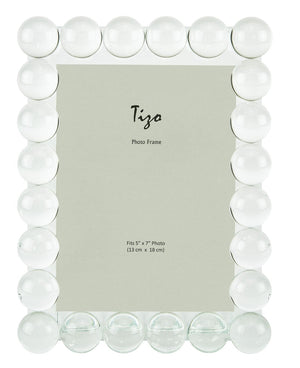 The Crystal Glass Single Bubble Frame Collection by Tizo Design features a rectangular frame with crystal-clear glass spheres, sized for a 5x7 inch (13x18 cm) photo—perfect for an elegant tabletop display.