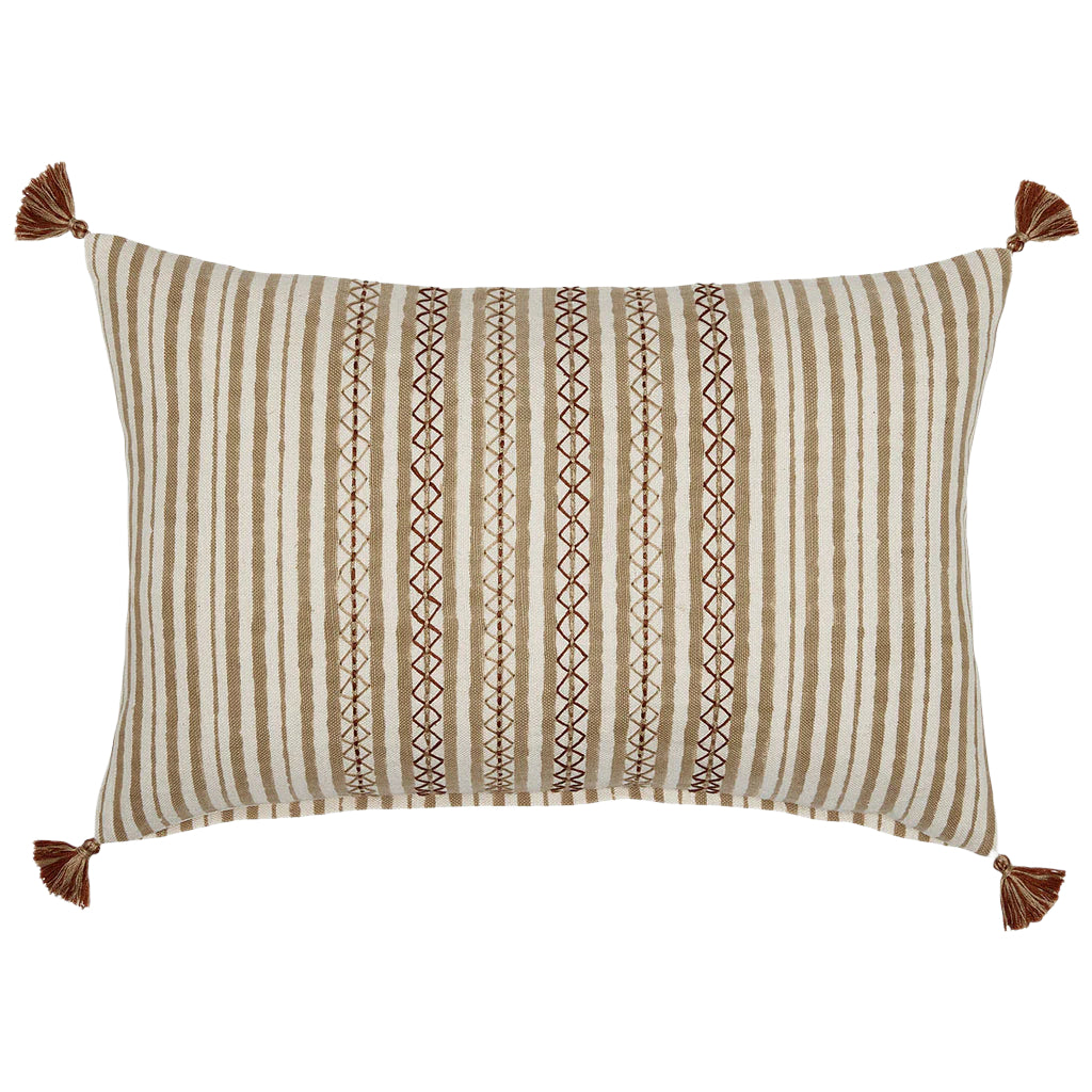 The Bhuv Sand Kidney Pillow by John Robshaw features beige and brown vertical stripes, central red geometric embroidery, and decorative tassels on each corner.