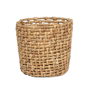 The Pigeon & Poodle Astoria Natural Round Basket, crafted from woven water hyacinth with an open top and 15" diameter, is shown against a white background.