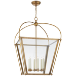 Elegant Visual Comfort Plantation Large Square Lantern with a glass enclosure and four E12 candelabra-style lights, suspended from a ceiling.