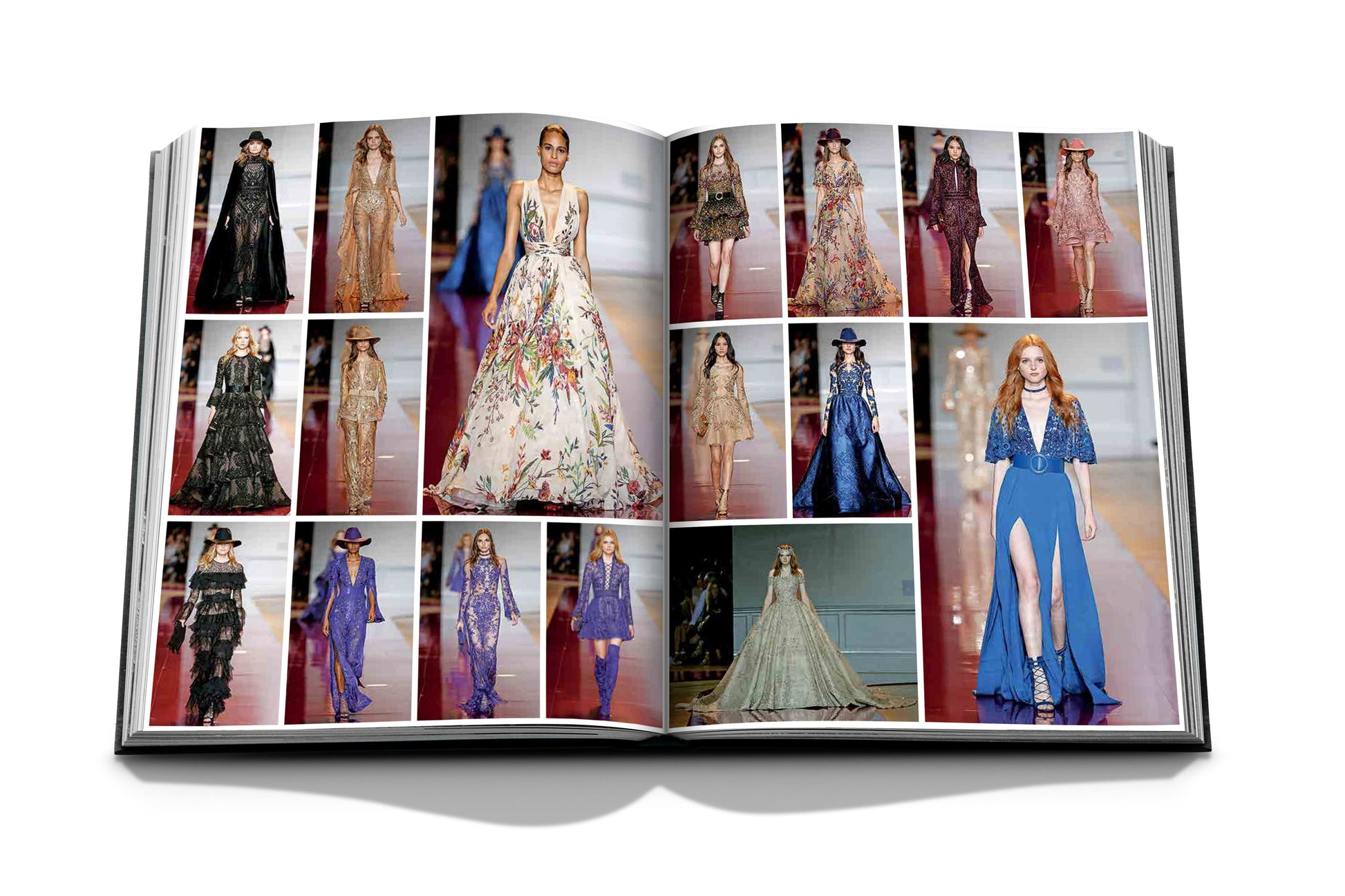 An open fashion magazine features stunning models in elegant dresses adorned with Assouline's Zuhair Murad signature handcrafted beading, highlighting his exquisite couture collections on the runway.