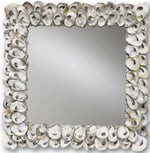 The Oyster Shell Mirror by Currey and Company features a square design with overlapping oyster shells, creating a nautical-inspired decorative piece that reflects a neutral background.