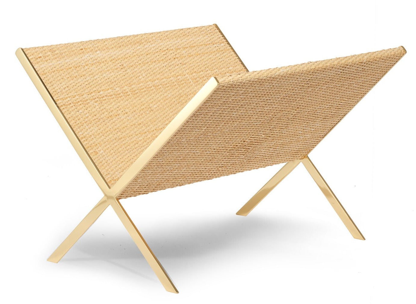 The Colette Cane Magazine Rack by Aerin features a brass frame and woven cane panels in a V-shape, perfect for holding magazines or newspapers.