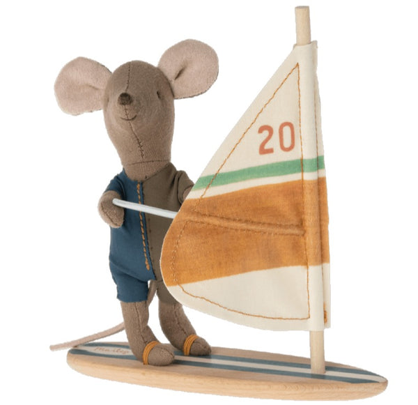 Maileg Beach Mice, Surfer Little Brother stuffed toy mouse in a sailing outfit holding a sail on a wooden surfboard with magnetic hands.