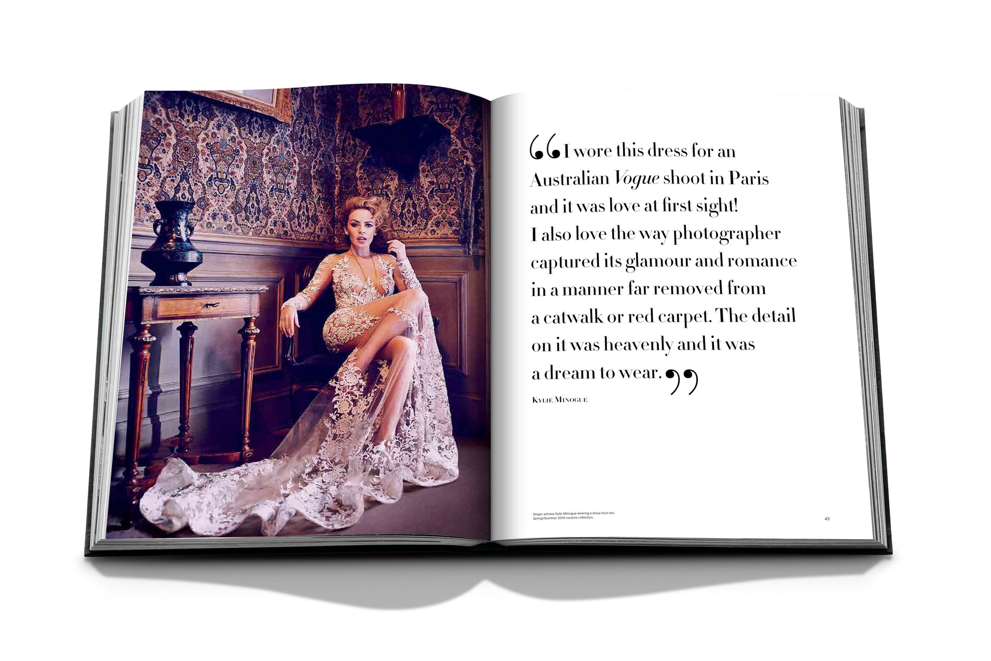 Magazine spread featuring a woman in an ornate room, wearing Zuhair Murad by Assouline. A quote on the right describes its debut in Australian Vogue and red carpet appeal, highlighting signature couture collections and exquisite handcrafted beading.