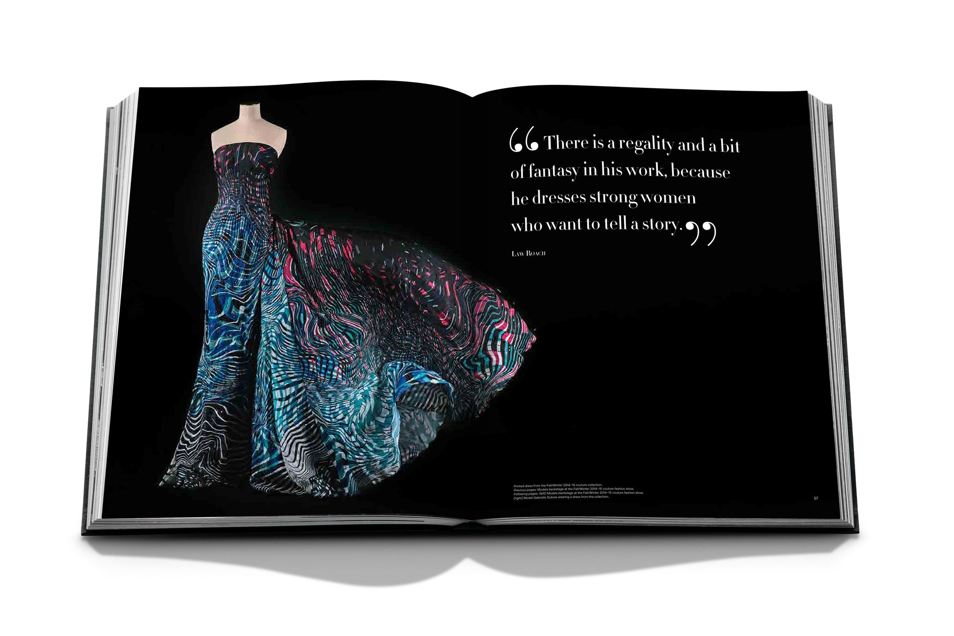 The Assouline book features a strapless gown with a colorful abstract pattern and a quote on storytelling in fashion, echoing Zuhair Murad's couture collections known for exquisite handcrafted beading.