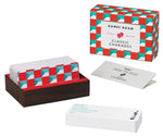 Box of Classic Charades question cards for family game night by Chronicle Books.