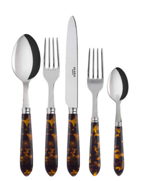 The Sabre Tortoise 5 Piece Flatware Set features polished silver tops and brown tortoiseshell-patterned handles. Includes a knife, two forks, and two spoons of different sizes. Dishwasher safe; imported from Paris.