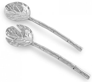 The Beatriz Ball Garden Salad Servers feature detailed leaf-shaped heads and bamboo-style handles, shown in silver on a white background.