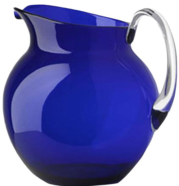 A Palla Acrylic Pitcher Transparent, Blue with a silver handle, recommended for handwash by Mario Luca Giusti.
