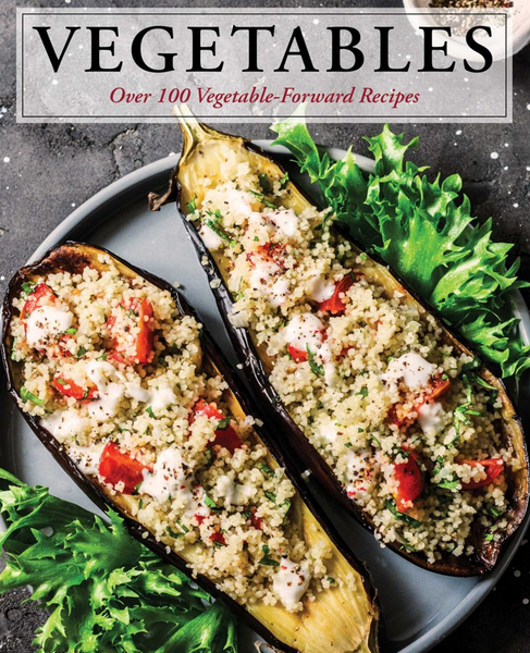 Stuffed eggplants with couscous and diced Common Ground vegetables on a platter, featured in a cookbook with seasonal, vegetable-forward recipes.