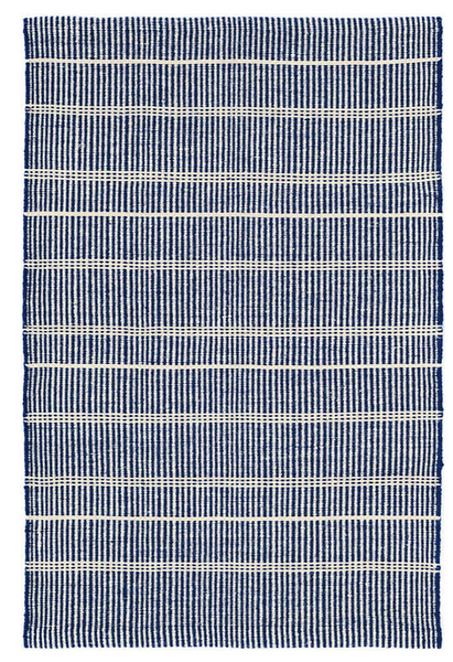 A Dash & Albert dba Annie Selke navy and white striped Samson Indoor/Outdoor Rug, made from recycled plastic bottles, on a white background.