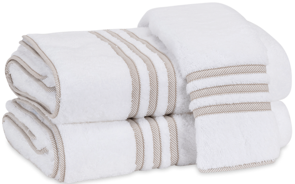 A set of Matouk Beach Road Collection, Tan Stripe towels, neatly folded and made from OEKO-TEX® Standard 100 certified Cairo long-staple cotton.