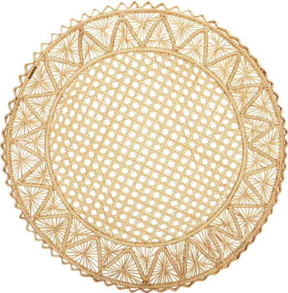 A Mercedes Salazar handmade Raffia Placemat with a woven intricate raffia design, featuring a gold woven plate on a white background.
