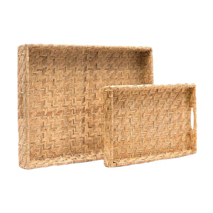 The Cadie Natural Flat Small Rattan Tray by Made Goods features a striking herringbone pattern and pairs with a larger, similarly designed tray for an eye-catching display.