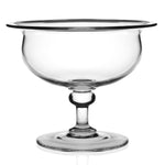 The William Yeoward Crystal Classic Footed Centrepiece, 10.5", is a clear handmade glass dessert bowl with a wide rim and short pedestal base—ideal as a dining table centrepiece, shown against a white background.