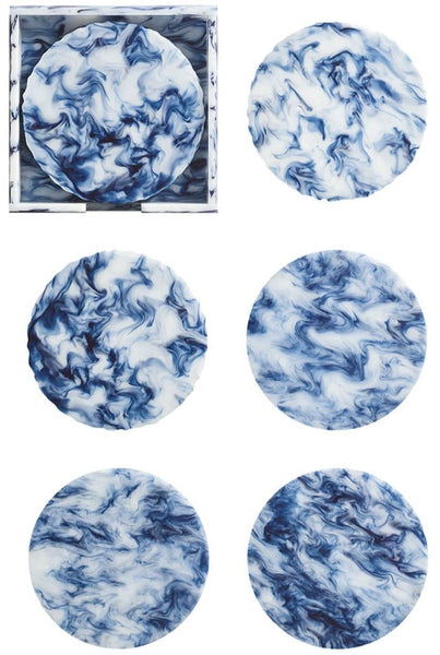 Six circular and square acrylic Waves White/Navy Drink Coasters with blue and white marbled patterns, resembling ocean waves by Kim Seybert.