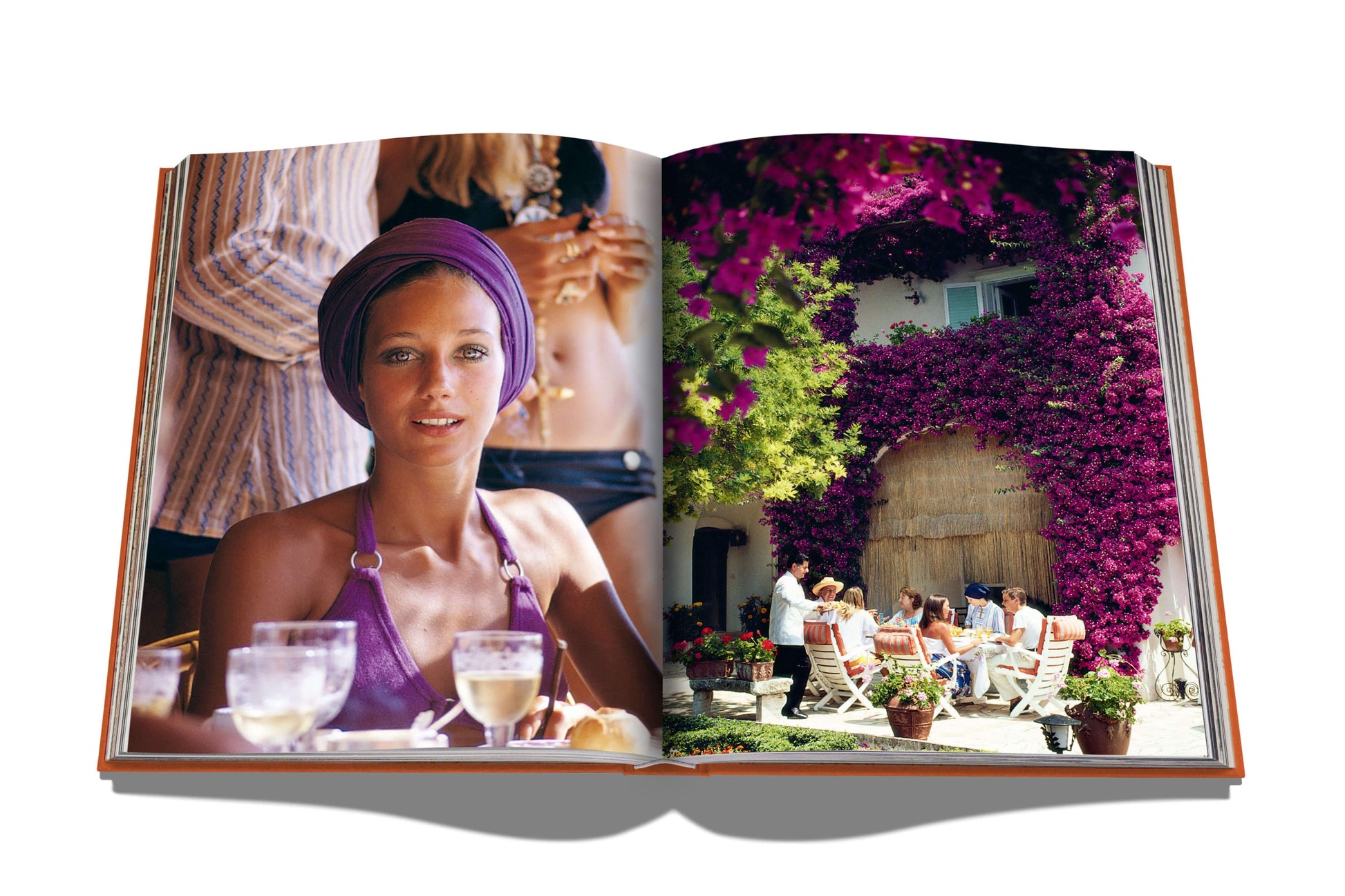 Open magazine displaying a Capri Dolce Vita travel lifestyle scene with a woman in a purple outfit on the left page and a group of people enjoying the Mediterranean spirit by dining outdoors on the right page, all evocative of Assouline.