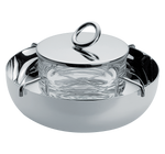 The Christofle Vertigo Small Caviar Serving Set features a silver-plated lidded dish with a circular handle, an inner glass bowl, and embodies the elegant design of Andrée Putman.
