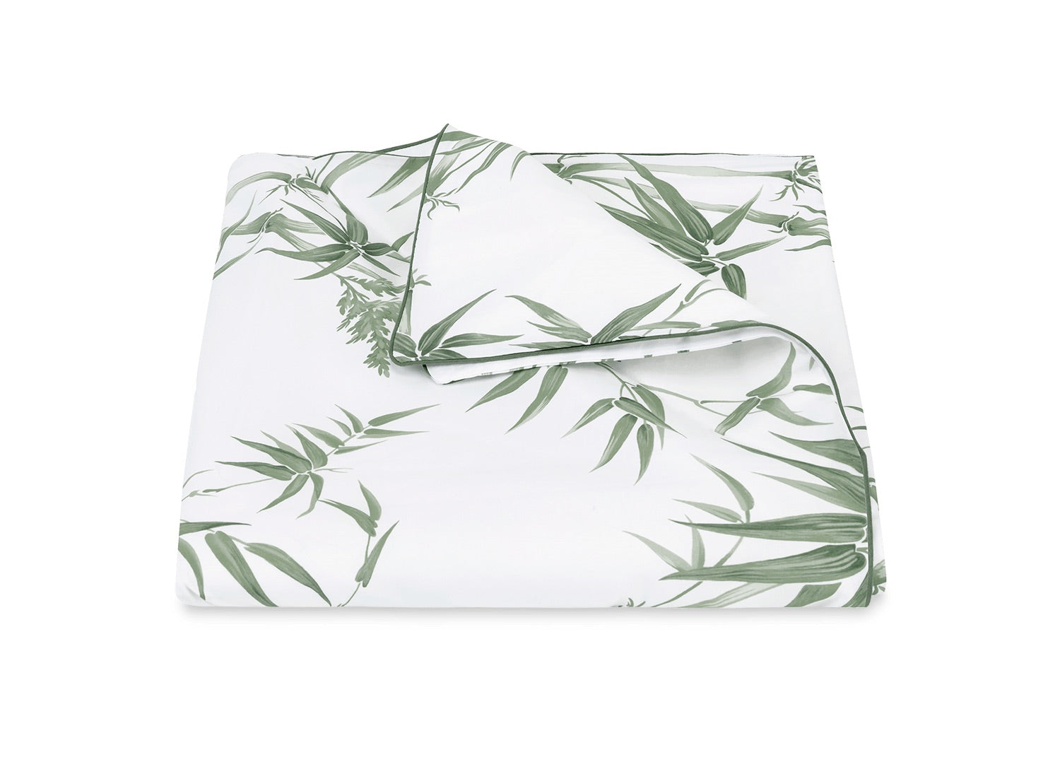 The Dominique Bedding Collection, Palm by Matouk features a folded white sheet with a green palm pattern, inspired by tropical bamboos, crafted from luxurious Egyptian cotton and OEKO-TEX Standard 100 certified.