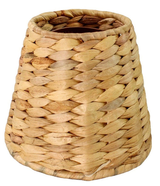 A small woven basket with a Maison Maison x Zafferano Empire Water Hyacinth Shade on a white background.