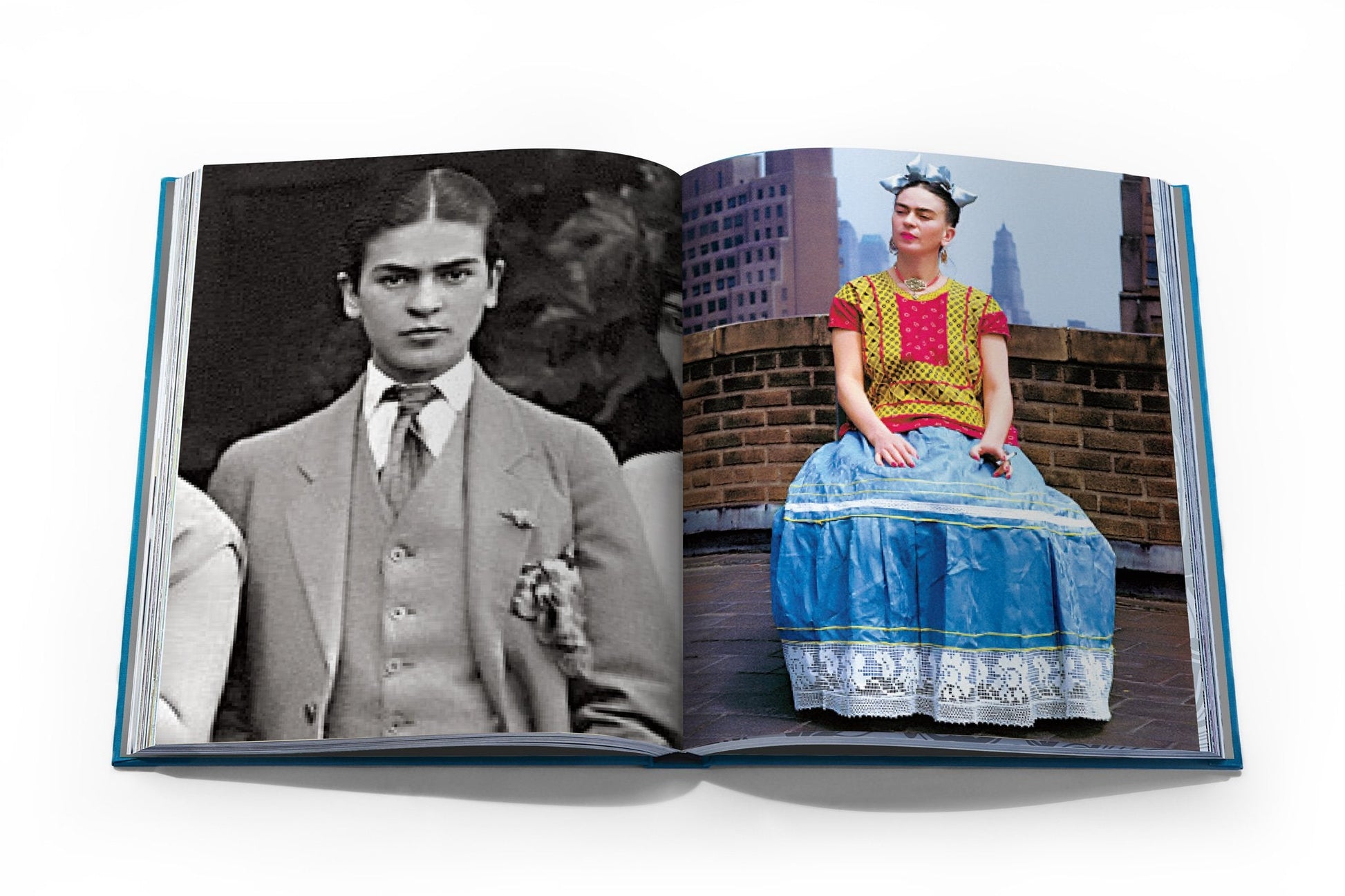 The Assouline book, *Frida Kahlo: Fashion As the Art of Being*, reveals two images: a woman on a rooftop in traditional attire and another in black-and-white with a suit—capturing Frida Kahlo's timeless artistry and elegance.