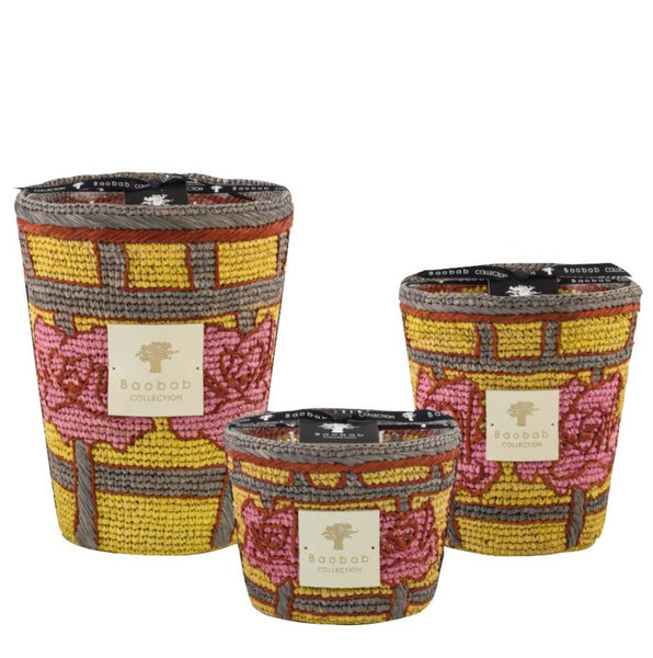 Three decorative scented Baobab Frida Draozy Magda Candle Collection candles with patterned designs.