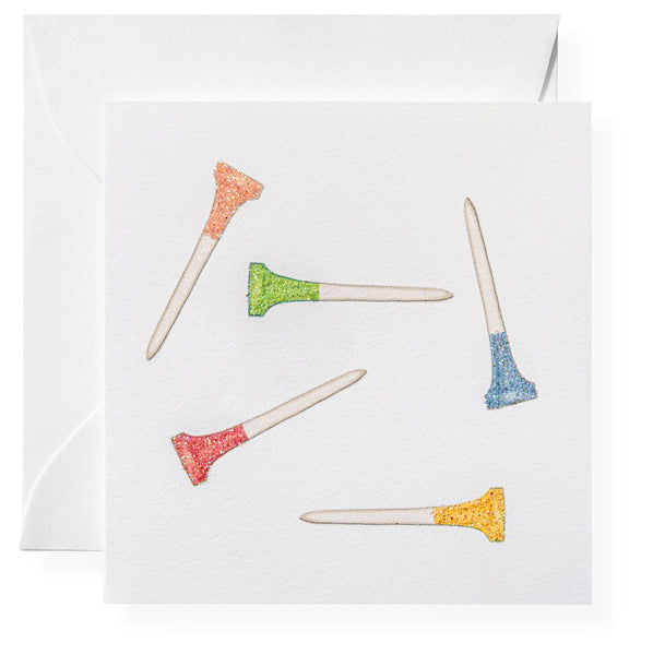 A Karen Adams - Golf Clap hand-glittered card featuring colorful golf tees atop an acrylic box.
