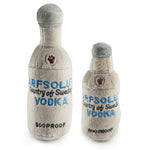 The Haute Diggity Dog Arfsolut Vodka Dog Toy resembles a vodka bottle with paw print logo and "800PROOF" text. Available in two sizes, each plush includes a squeaker for extra fun.