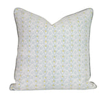 The Bellflower Mineral Pillow by Hive Custom Pillows is handmade in the USA, featuring a light blue and white geometric pattern with small yellow accents on a plain white background.