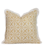 The Kori Yellow Pillow by Hive Custom Pillows features a geometric yellow and white leaf pattern with custom fringe trim, shown against a white background.