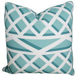 The Treillage Bleu Outdoor Pillow by Associated Design is a square pillow in teal and white with a geometric pattern of intersecting lines, handmade in the USA for unique style and quality craftsmanship.