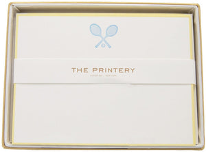 The Printery's Tennis Racquets Ness Blue Card Set features bright white cards with two crossed tennis racquets and a gold border atop each notecard.