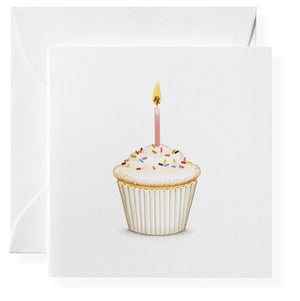 The Karen Adams Sweet Birthday Wishes Gift Enclosures feature a cupcake with white frosting, colorful sprinkles, and a pink candle—perfect for birthday wishes. Includes a matching envelope partially visible behind the charming card.