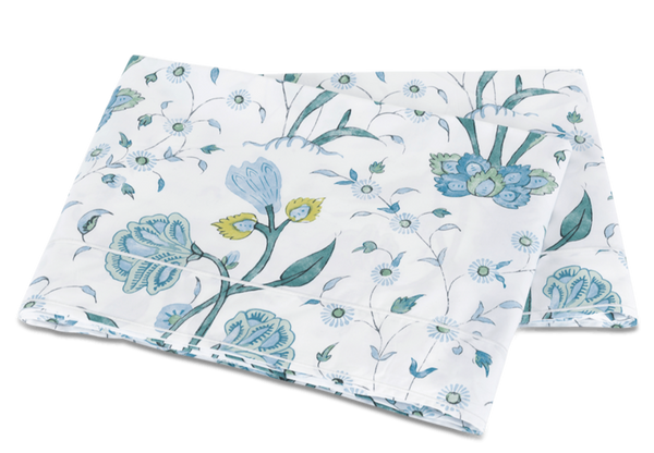 Floral patterned fabric from the Matouk Schumacher Bedding Collection, Khilana, folded neatly on a white background.