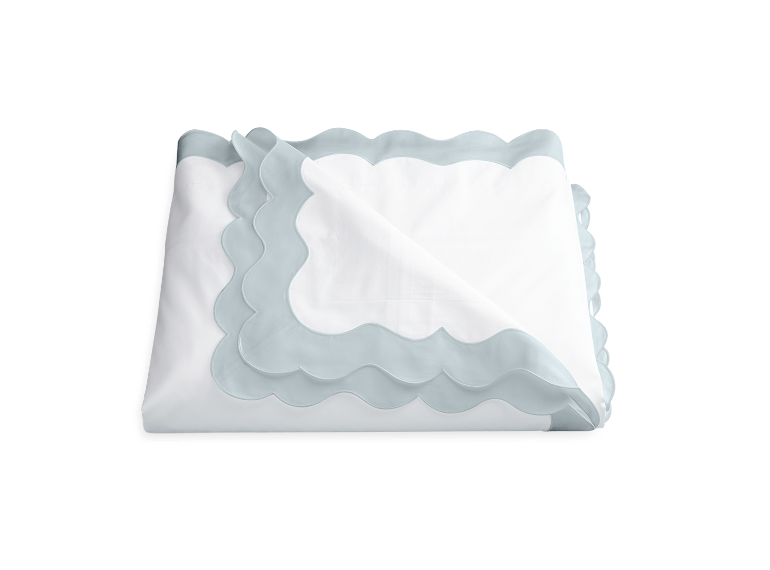 A neatly folded white Matouk Lorelei Bedding Collection, Pool, percale sheet with a 600 thread count and light blue scallop applique border, displayed against a plain background.