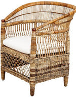 A hand-woven PALECEK Rattan Chair with a white seat cushion.