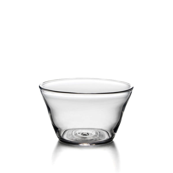 A Simon Pearce Nantucket Medium Bowl, crafted by Simon Pearce, elegantly displayed on a pristine white surface.