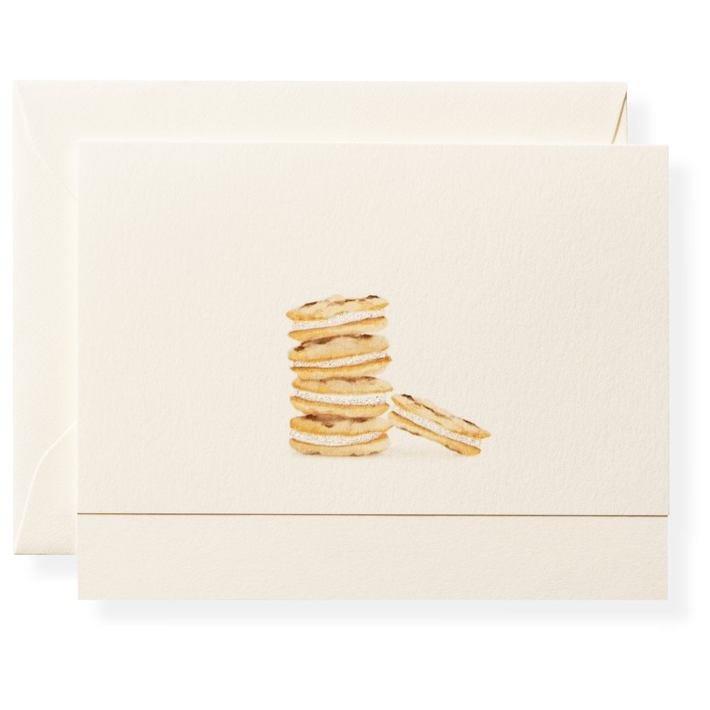 The Karen Adams Flour Shoppe Card Set features cream-colored notecards hand-embellished with sandwich cookie illustrations and matching envelopes—perfect as a charming hostess gift or for your note card collection.