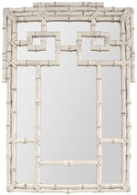 The Bamboo Mirror, Silver by Carvers' Guild features a rectangular design with a decorative faux bamboo frame in a light, neutral shade. The Oriental bamboo motif and geometric patterns bring symmetry and elegance to the piece.