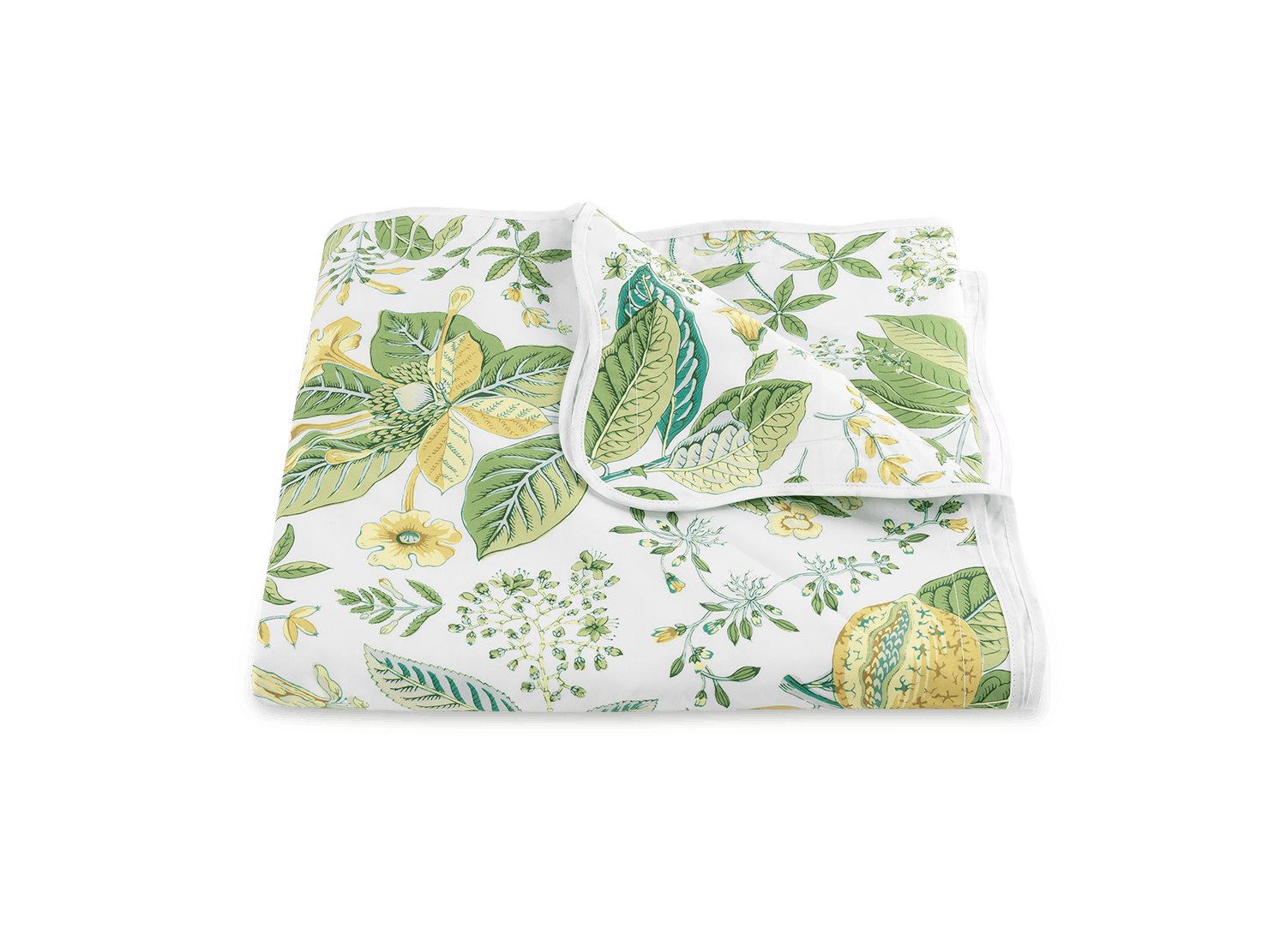 A white fabric book cover with a Matouk Pomegranate botanical print featuring leaves and flowers, displayed on a green background.