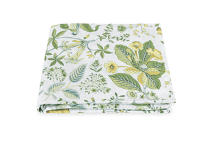A folded Matouk Pomegranate Bedding Collection bedsheet with green and yellow botanical prints on a solid green background, OEKO-TEX Standard 100 certified.