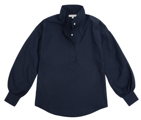 This navy Ann Mashburn Anaya Popover Shirt features a half-placket with buttons and cuffs, designed to flatter the wearer.