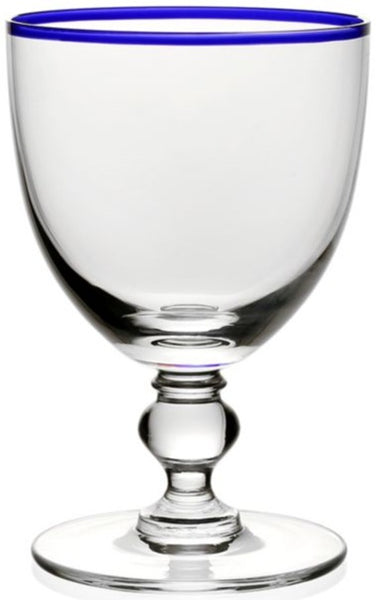 A William Yeoward Crystal Siena Water Glass Blue 11 oz with a colorful rim.