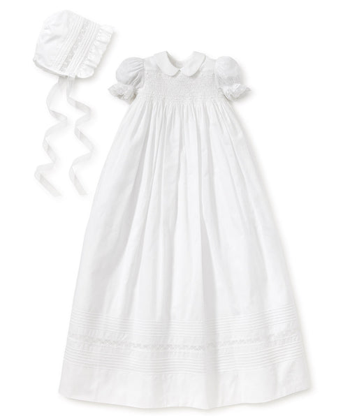 A white Kissy Kissy Silene Christening Gown & Hat Set with smocking.