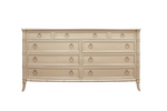 The Double Bureau by Kindel, made from cherry solids, includes nine drawers with round nickel handles. It features a light wood finish and slightly curved legs, reflecting the Chinese Chippendale style.