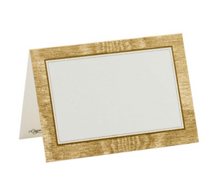 The Caspari Moire Gold Place Cards feature a classic folded design with a gold textured border and plain white center, making them elegant for place settings. Photographed on a white background.